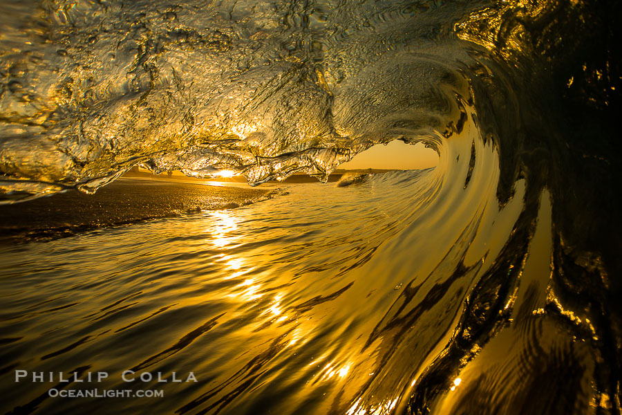 Sunrise breaking wave, dawn surf, The Wedge, Newport Beach, California