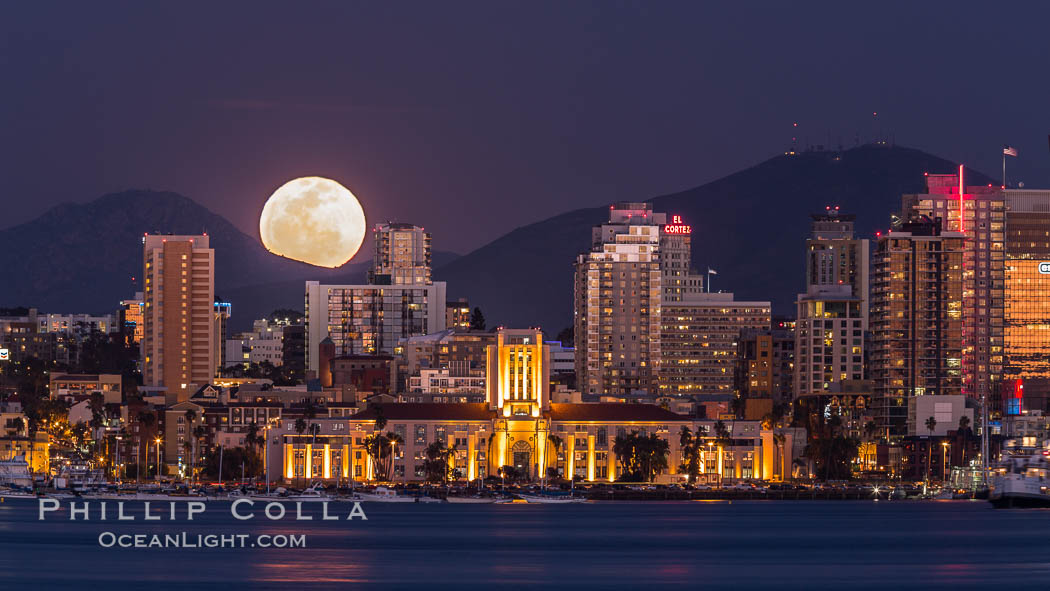 Full Moon rising over San Diego City Skyline, viewed from Harbor Island. Mount San Miguel is to the right, Lyons Peak to the left, in the distance. California, USA, natural history stock photograph, photo id 29121