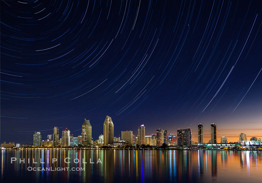 Approaching sunrise and star trails over the San Diego Downtown City Skyline.  In this 60 minute exposure, stars create trails through the night sky over downtown San Diego. California, USA, natural history stock photograph, photo id 28386