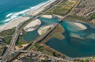 Aerial photo of Batiquitos Lagoon, Carlsbad. The Batiquitos Lagoon is a coastal wetland in southern Carlsbad, California. Part of the lagoon is designated as the Batiquitos Lagoon State Marine Conservation Area, run by the California Department of Fish and Game as a nature reserve