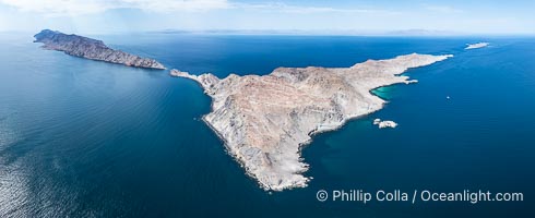 Aerial photo of Islas San Lorenzo in the Sea of Cortez. San Lorenzo Marine Archipelago National Park is a national park of Mexico located on San Lorenzo Island part of an archipelago in the Gulf of California off the eastern coast of Baja California. The San Lorenzo Archipelago is considered one of the most important ecological areas of the Gulf of California. The Island and surrounding areas are part of a rich ecosystem comprised by a grand variety of flora and marine fauna. This area is protected by the Mexican federal government Norma Oficial Mexicana because of its importance as a habitat for several endangered species