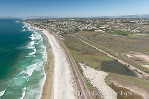 Aerial Photo of San Elijo Lagoon and Cardiff Reef beach. San Elijo Lagoon Ecological Reserve is one of the largest remaining coastal wetlands in San Diego County, California, on the border of Encinitas, Solana Beach and Rancho Santa Fe