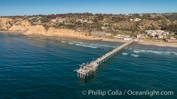 Aerial Photo of Scripps Pier. SIO Pier. The Scripps Institution of Oceanography research pier is 1090 feet long and was built of reinforced concrete in 1988, replacing the original wooden pier built in 1915. The Scripps Pier is home to a variety of sensing equipment above and below water that collects various oceanographic data. The Scripps research diving facility is located at the foot of the pier. Fresh seawater is pumped from the pier to the many tanks and facilities of SIO, including the Birch Aquarium. The Scripps Pier is named in honor of Ellen Browning Scripps, the most significant donor and benefactor of the Institution