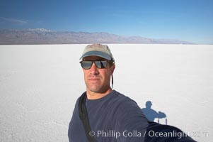 Self portrait on salt pan, Death Valley National Park, California