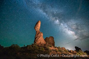 Balanced Rock and Milky Way stars at night, Arches National Park, Utah