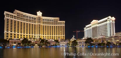 The Bellagio Hotel (left) and Caesar's Palace (right) reflected in the fountain pool, at night.  The Bellagio Hotel fountains are one of the most popular attractions in Las Vegas, showing every half hour or so throughout the day, choreographed to famous Hollywood music