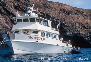 Boat Horizon loading diver into skiff, Guadalupe Island (Isla Guadalupe)