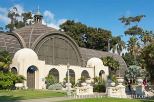 The Botanical Building in Balboa Park, San Diego.  The Botanical Building, at 250 feet long by 75 feet wide and 60 feet tall, was the largest wood lath structure in the world when it was built in 1915 for the Panama-California Exposition. The Botanical Building, located on the Prado, west of the Museum of Art, contains about 2,100 permanent tropical plants along with changing seasonal flowers. The Lily Pond, just south of the Botanical Building, is an eloquent example of the use of reflecting pools to enhance architecture. The 193 by 43 foot pond and smaller companion pool were originally referred to as Las Lagunas de las Flores (The Lakes of the Flowers) and were designed as aquatic gardens. The pools contain exotic water lilies and lotus which bloom spring through fall.  Balboa Park, San Diego