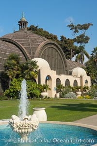 The Botanical Building in Balboa Park, San Diego.  The Botanical Building, at 250 feet long by 75 feet wide and 60 feet tall, was the largest wood lath structure in the world when it was built in 1915 for the Panama-California Exposition. The Botanical Building, located on the Prado, west of the Museum of Art, contains about 2,100 permanent tropical plants along with changing seasonal flowers. The Lily Pond, just south of the Botanical Building, is an eloquent example of the use of reflecting pools to enhance architecture. The 193 by 43 foot pond and smaller companion pool were originally referred to as Las Lagunas de las Flores (The Lakes of the Flowers) and were designed as aquatic gardens. The pools contain exotic water lilies and lotus which bloom spring through fall.  Balboa Park, San Diego