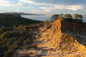 Broken Hill with La Jolla and the Pacific Ocean in the distance.  Broken Hill is an ancient, compacted sand dune that was uplifted to its present location and is now eroding, Torrey Pines State Reserve, San Diego, California
