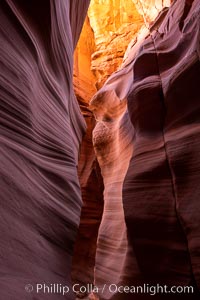 Canyon X, a spectacular slot canyon near Page, Arizona.  Slot canyons are formed when water and wind erode a cut through a (usually sandstone) mesa, producing a very narrow passage that may be as slim as a few feet and a hundred feet or more in height