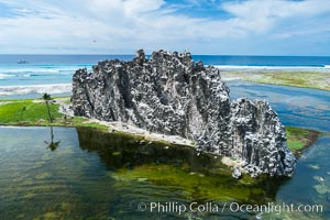 Clipperton Rock, a 95' high volcanic remnant, is the highest point on Clipperton Island, a spectacular coral atoll in the eastern Pacific. By permit HC / 1485 / CAB (France)