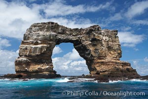 Darwin's Arch, a dramatic 50-foot tall natural lava arch, rises above the ocean a short distance offshore of Darwin Island. On June 10, 2021, Darwin's Arch broke and fell into the ocean, leaving behind two partial pillars