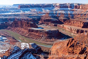 Dead Horse Point Overlook, with the Colorado River flowing 2,000 feet below.  300 million years of erosion has carved the expansive canyons, cliffs and walls below and surrounding Deadhorse Point, Deadhorse Point State Park, Utah
