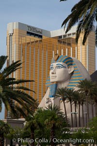 Egyptian Sphinx, replica, front entrance of the Luxor Hotel in Las Vegas, with theHotel (Mandalay Bay hotel) in the background