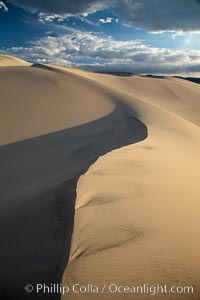 Eureka Dunes.  The Eureka Valley Sand Dunes are California's tallest sand dunes, and one of the tallest in the United States.  Rising 680' above the floor of the Eureka Valley, the Eureka sand dunes are home to several endangered species, as well as "singing sand" that makes strange sounds when it shifts.  Located in the remote northern portion of Death Valley National Park, the Eureka Dunes see very few visitors