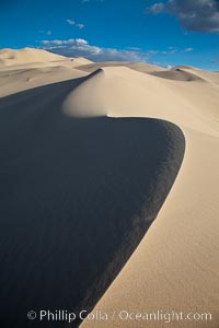 Eureka Dunes.  The Eureka Valley Sand Dunes are California's tallest sand dunes, and one of the tallest in the United States.  Rising 680' above the floor of the Eureka Valley, the Eureka sand dunes are home to several endangered species, as well as "singing sand" that makes strange sounds when it shifts.  Located in the remote northern portion of Death Valley National Park, the Eureka Dunes see very few visitors