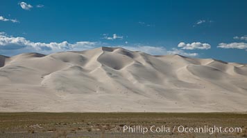 Eureka Dunes.  The Eureka Dunes are California's tallest sand dunes, and one of the tallest in the United States.  Rising 680' above the floor of the Eureka Valley, the Eureka sand dunes are home to several endangered species, as well as "singing sand" that makes strange sounds when it shifts, Death Valley National Park