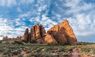 Sandstone fins stand on edge.  Vertical fractures separate standing plates of sandstone that are eroded into freestanding fins, that may one day further erode into arches, Arches National Park, Utah