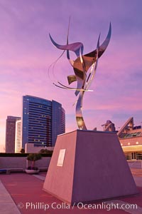 Flama de la Amistad, a statue by Leonardo Nierman.  Installed in the San Diego Convention Centers outdoor amphitheater, Flame of Friendship is a polished, stainless-steel statue set against San Diego Bay weighing 3,700 pounds and standing 20 feet tall and eight feet wide