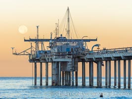 Full Moon Setting Over SIO Pier in the moments just before sunrise, Scripps Institution of Oceanography, La Jolla, California