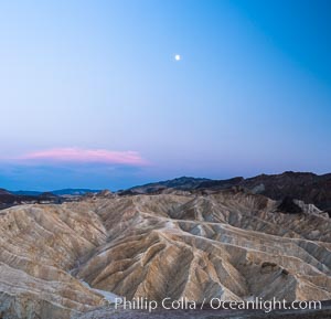 Full moon over Zabriskie Point landscape, Death Valley National Park, California