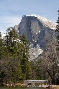 Half Dome rises above the Merced River and Sentinel Bridge.  Yosemite Valley, Yosemite National Park, California