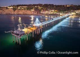 Holiday Christmas Lights on Scripps Pier, Blacks Beach and Scripps Institution of Oceanography, sunset, aerial, La Jolla, California