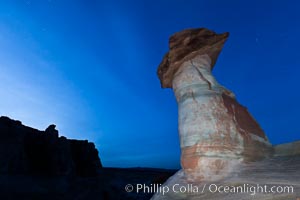 Pedestal rock, or hoodoo, at Stud Horse Point.  These hoodoos form when erosion occurs around but not underneath a more resistant caprock that sits atop of the hoodoo spire, Page, Arizona