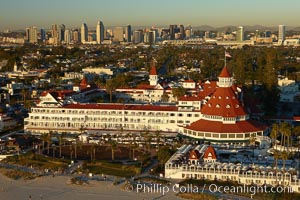 Hotel del Coronado, known affectionately as the Hotel Del.  It was once the largest hotel in the world, and is one of the few remaining wooden Victorian beach resorts.  It sits on the beach on Coronado Island, seen here with downtown San Diego in the distance.  It is widely considered to be one of Americas most beautiful and classic hotels. Built in 1888, it was designated a National Historic Landmark in 1977