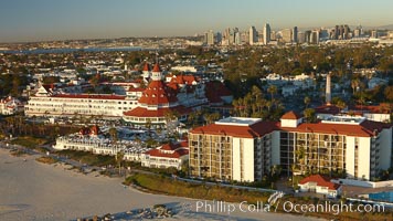 Hotel del Coronado, known affectionately as the Hotel Del.  It was once the largest hotel in the world, and is one of the few remaining wooden Victorian beach resorts.  It sits on the beach on Coronado Island, seen here with downtown San Diego in the distance.  It is widely considered to be one of Americas most beautiful and classic hotels. Built in 1888, it was designated a National Historic Landmark in 1977