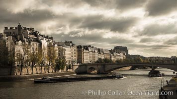 Ile Saint-Louis, is one of two natural islands in the Seine river, in Paris, France. The island is named after King Louis IX of France (Saint Louis). The island is connected to the rest of Paris by bridges to both banks of the river and by the Pont Saint Louis to the Ile de la Cite