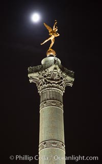 July Column in the Place de la Bastille. The Place de la Bastille is a square in Paris, where the Bastille prison stood until the 'Storming of the Bastille' and its subsequent physical destruction between 14 July 1789 and 14 July 1790 during the French Revolution. The square straddles 3 arrondissements of Paris, namely the 4th, 11th and 12th. The July Column (Colonne de Juillet) which commemorates the events of the July Revolution (1830) stands at the center of the square