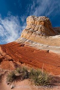 Brilliant red striations around the base of this pinnacle are responsible for its name: the Lollipop, White Pocket, Vermillion Cliffs National Monument, Arizona