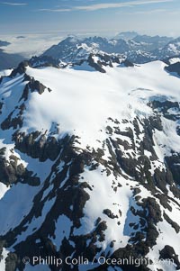 Glaciers on the summit of Mariner Mountain, on the west coast of Vancouver Island, British Columbia, Canada, part of Strathcona Provincial Park, located 36 km (22 mi) north of Tofino.  It is 1,771 m (5,810 ft) high and is snow covered year-round