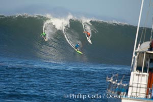 Brock Little (green), Shane Desmond (blue), Randy Cone (orange), heat one, Mavericks surf contest, February 7, 2006, Half Moon Bay, California