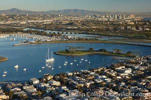 Mission Bay is the largest man-made aquatic park in the country.  It spans 4,235 acres and is split nearly evenly between land and water.  It is situated between the communities of Pacific Beach, Mission Beach, Bay Park and bordered on the south by the San Diego River channel.  Once named "False Bay" by Juan Cabrillo in 1542, the tidelands were dredged in the 1940's creating the basins and islands of what is now Mission Bay
