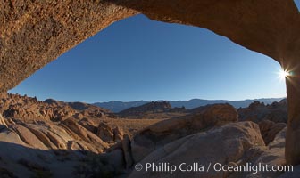 The Alabama Hills viewed through the natural stone arch of Mobius Arch, early morning, Alabama Hills Recreational Area