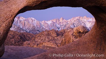 Mobius Arch at sunrise, framing snow dusted Lone Pine Peak and the Sierra Nevada Range in the background. Also known as Galen's Arch, Mobius Arch is found in the Alabama Hills Recreational Area near Lone Pine