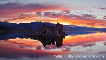 Mono Lake sunset, Sierra Nevada mountain range and tufas, clouds reflected in the still waters of Mono Lake