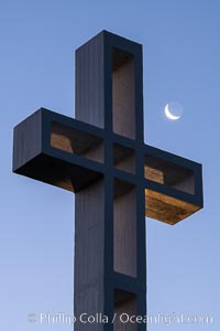 Moon over The Mount Soledad Cross, a landmark in La Jolla, California. The Mount Soledad Cross is a 29-foot-tall cross erected in 1954