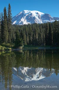 Mount Rainier rises above Reflection Lake, afternoon, Mount Rainier National Park, Washington