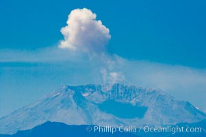 Mount St. Helens releases a burst of steam, viewed from Mount Rainier, Mount Rainier National Park, Washington