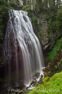 Narada Falls cascades down a cliff, with the flow blurred by a time exposure. Narada Falls is a 188 foot (57m) waterfall in Mount Rainier National Park