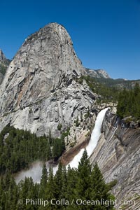 Liberty Cap and Nevada Falls,viewed from the John Muir Trail.  Merced River is in peak spring flow from heavy snow melt in the high country above Yosemite Valley, Yosemite National Park, California