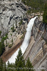 Nevada Falls viewed from the John Muir Trail, Merced River in peak spring flow from heavy snow melt in the high country above Yosemite Valley, Yosemite National Park, California