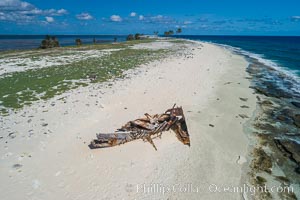 Old shipwreck debris on Clipperton Island aerial photo. Clipperton Island, a minor territory of France also known as Ile de la Passion, is a spectacular coral atoll in the eastern Pacific. By permit HC / 1485 / CAB (France)