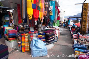 Otavalo market, a large and famous Andean market high in the Ecuadorian mountains, is crowded with locals and tourists each Saturday, San Pablo del Lago