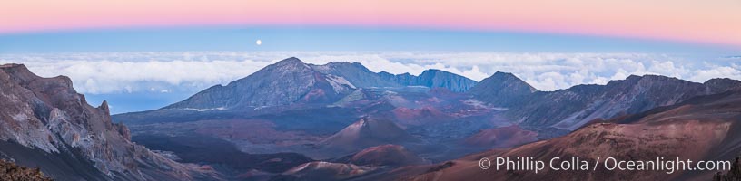 Panorama of Full Moon and Earth Shadow over Haleakala, Maui, Hawaii.  The dark band on the horizon is the shadow of the earth, while the lighter pink band is atmosphere that is still lit by the setting sun