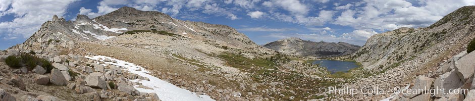 Panorama of Vogelsang basin, surrounding Vogelsang Lake in Yosemite's High Sierra, viewed from near Vogelsang Pass (10685').  Left is Vogelsang Peak (11516'), Choo-choo Ridge is in the distant middle, and the western flank of Fletcher Peak is to the right, Yosemite National Park, California